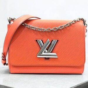 Louis Vuitton Crossbody Bag in Vibrant Orange with Silver Accents